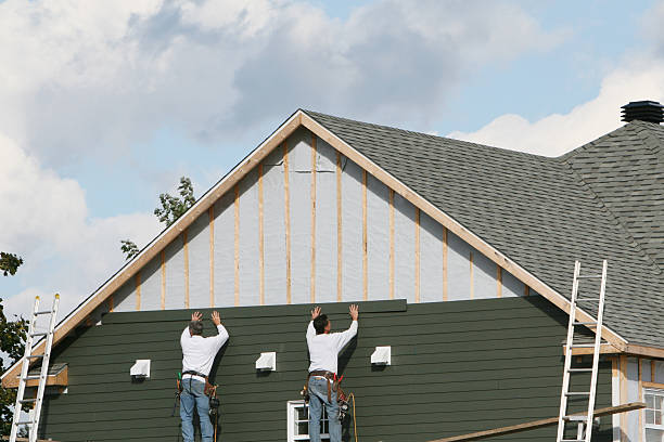 Professional Emergency Siding Repair technician working in Marengo, IL